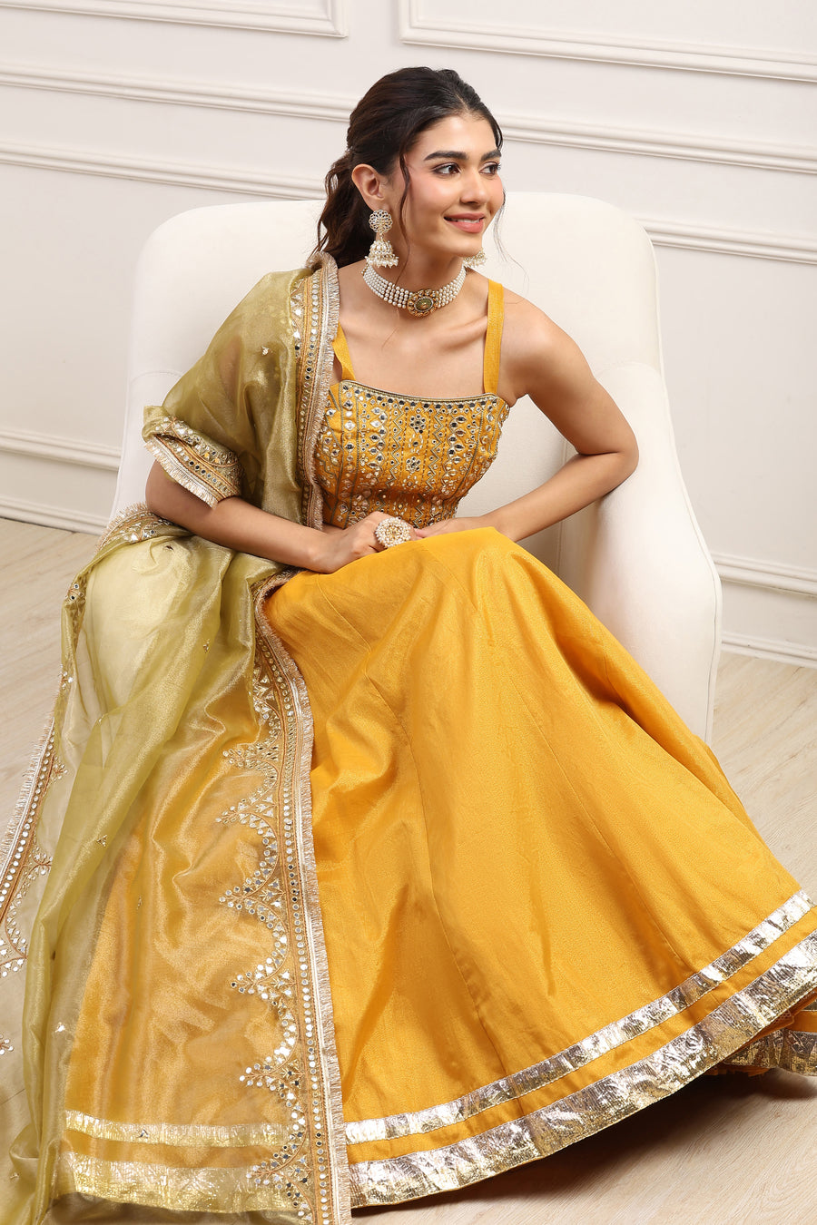 Mustard yellow zari tissue lehenga set for a haldi or mehendi