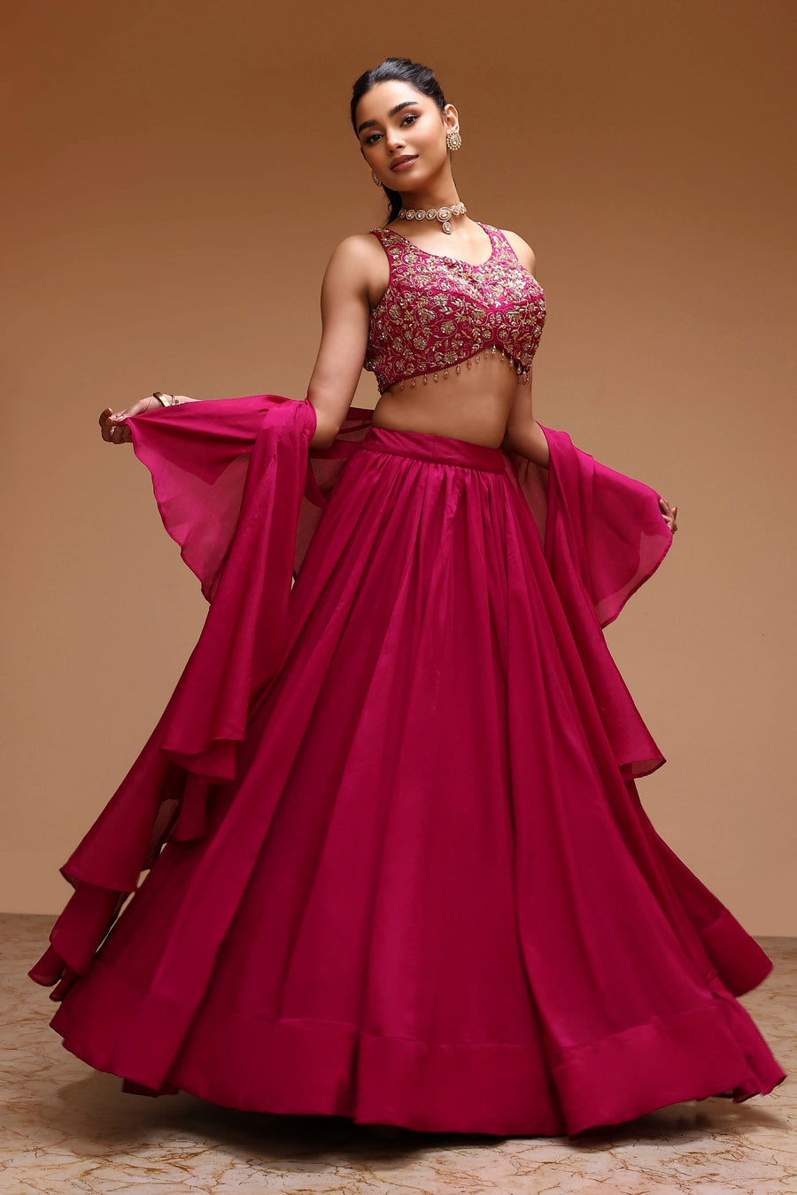 Magenta Pink Gold-Toned Embroidered Lehenga Choli with Flared Skirt